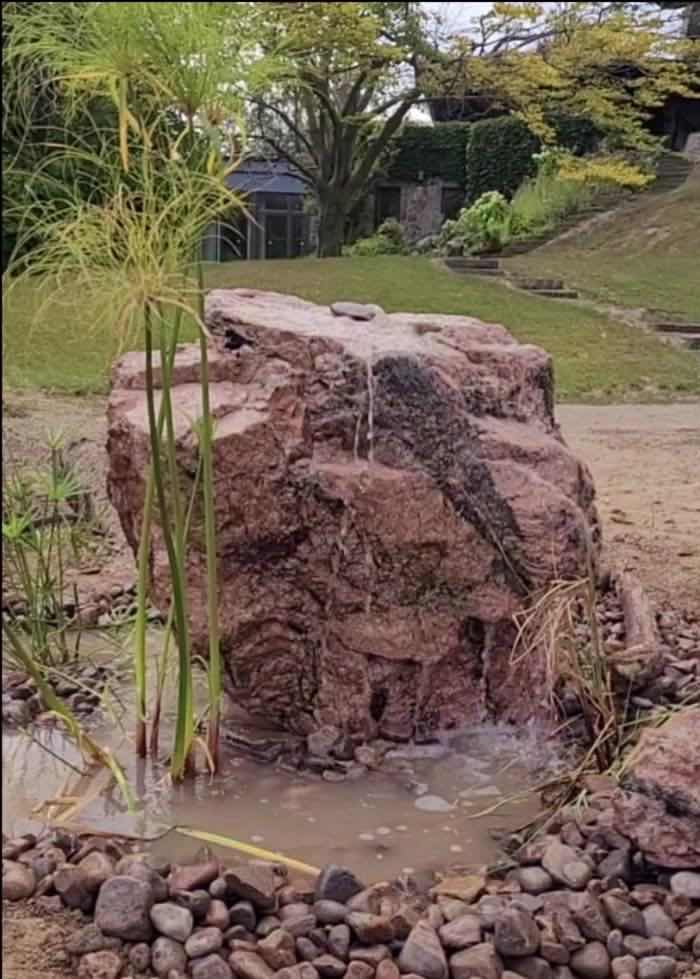 Natural bubbling rock fountain built for a yoga retreat